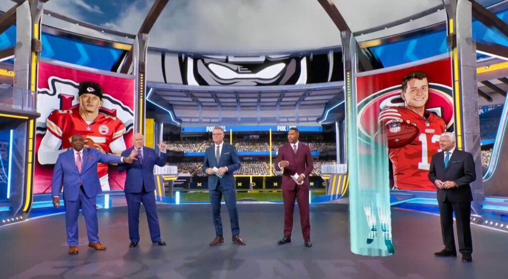 Tom Brady hologram and FOX NFL crew.