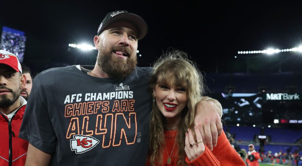 Travis Kelce of the Kansas City Chiefs celebrates with Taylor Swift after a 17-10 victory against the Baltimore Ravens