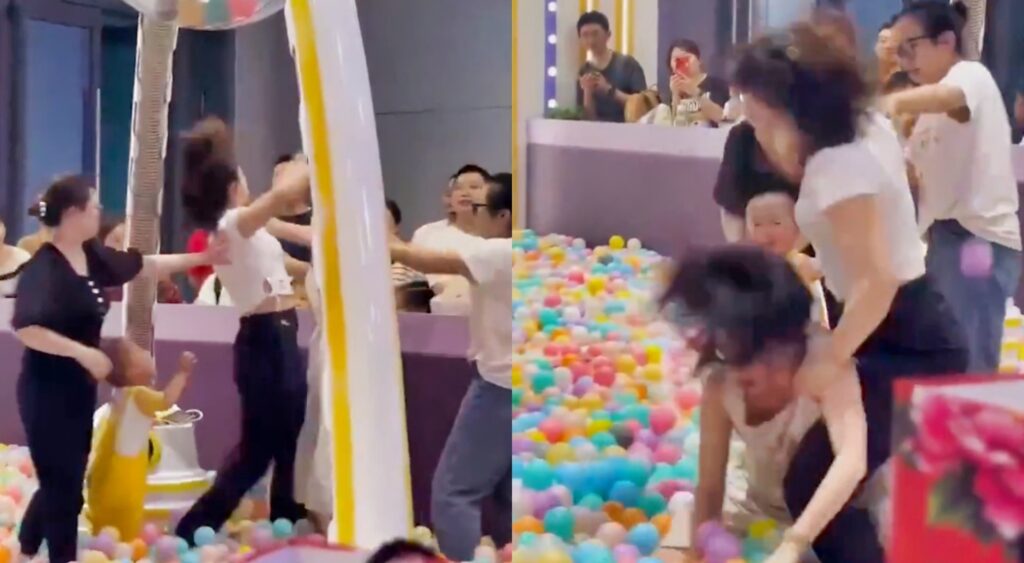 Two moms fighting in a ball pit