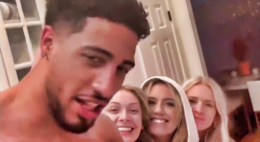 Tyrese Haliburton and 3 women