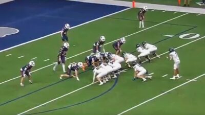 Wakeland and Lone Star high school players on field