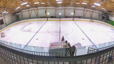 Zamboni being driven on ice