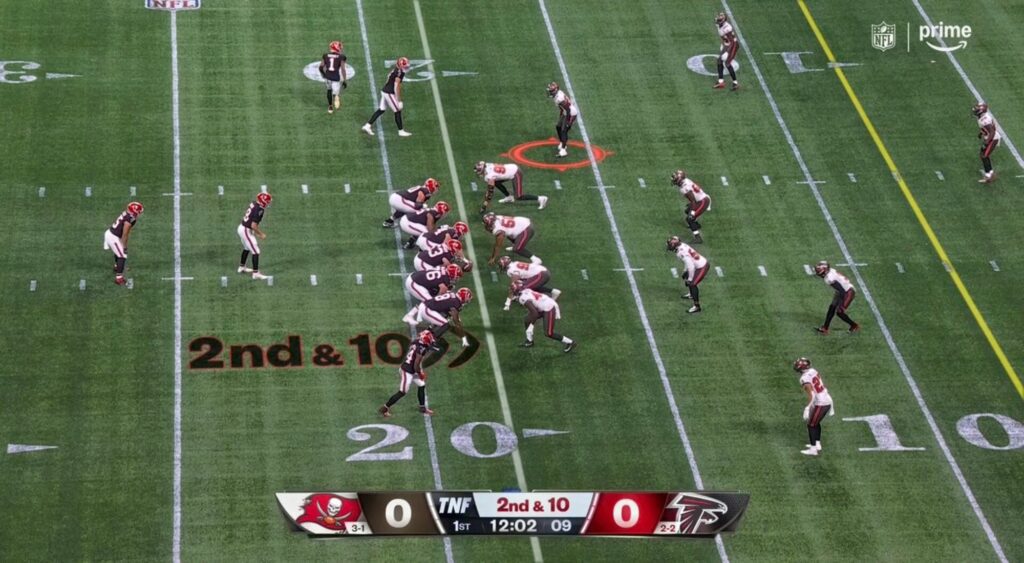 Atlanta Falcons running play before Drake London scores a TD over Christian Izien.