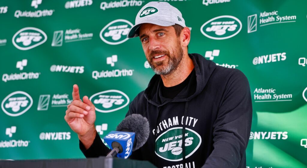 Quarterback Aaron Rodgers of the New York Jets talks to reporters after training camp at Atlantic Health Jets Training Center