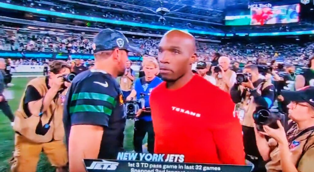 Aaron Rodgers and DeMeco Ryans during postgame handshake.