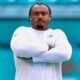 Austin Jackson of the Miami Dolphins poses for a photo during pregame warm-ups prior to a NFL match