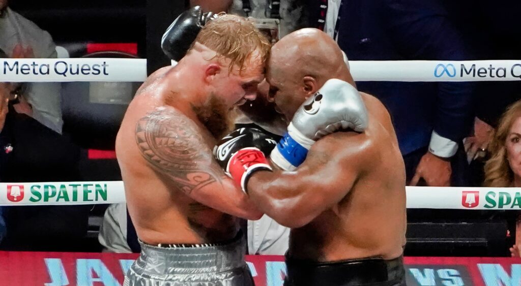 Jake Paul and Mike Tyson embrace following highly publicized boxing match