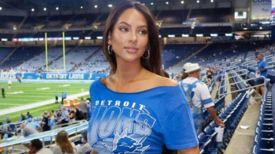 Christen Harper in blue Lions top