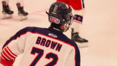 Photo of Colin Brown at hockey game