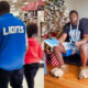 Photos of Detroit Lions fan at Target and on couch at home