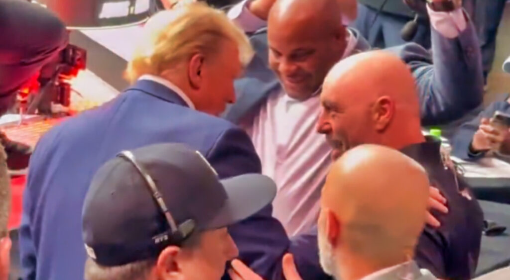 Donald Trump embracing Joe Rogan