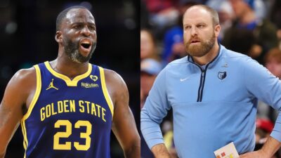 Draymond Green of the Golden State Warriors and Head coach of the Memphis Grizzlies, Taylor Jenkins