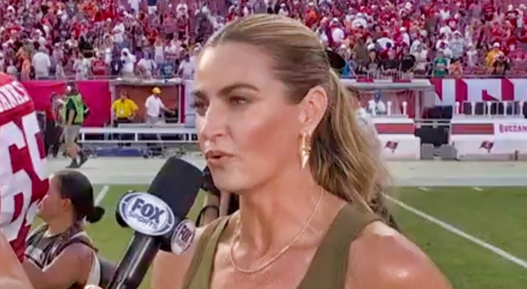 Erin Andrews interviewing George Kittle after the game.