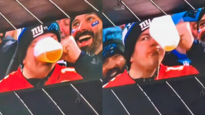 Fan drinking beer at Giants-Panthers game