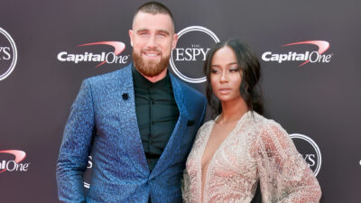 Travis Kelce posing with Kayla Nicole