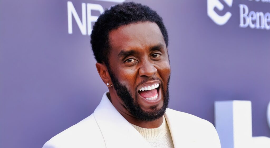 Sean "Diddy" Combs poses on the red carpet.