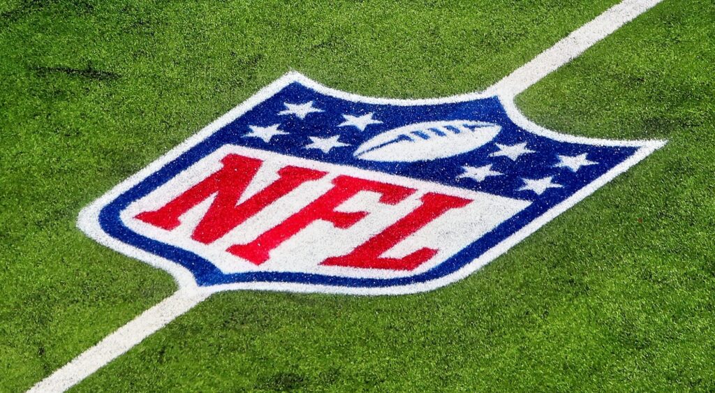 NFL logo shown on field. Daniel Jones will reportedly be released after the season.