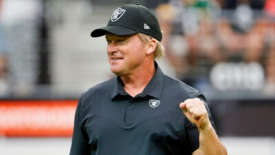 Jon Gruden pumping a fist