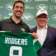 Aaron Rodgers posing for photo with Woody Johnson