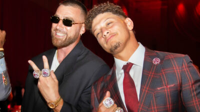 Travis Kelce and Patrick Mahomes flashing their Super Bowl rings