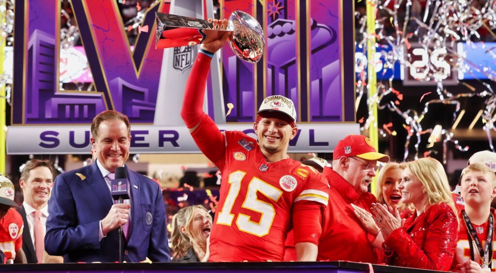 Patrick Mahomes holding the Lombardi Trophy