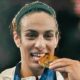 Imane Khelif with gold medal in her mouth