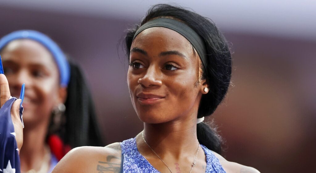 Sha’Carri Richardson on the track smiling