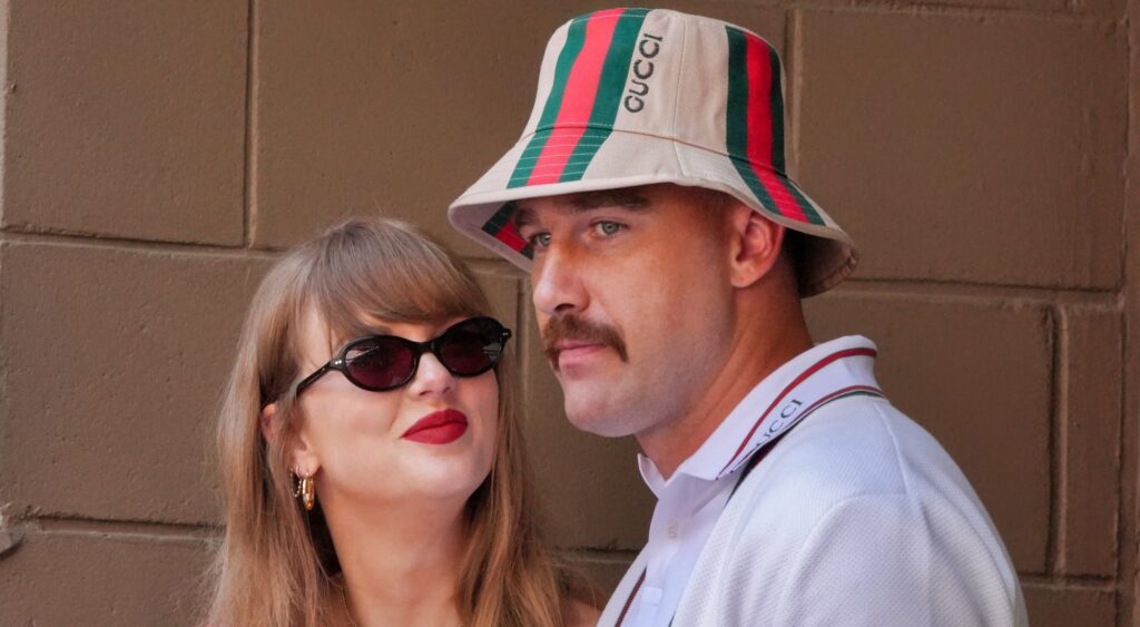 Taylor Swift and Travis Kelce watching tennis match.