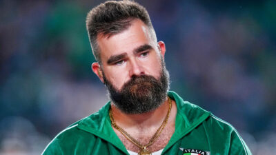 Jason Kelce in green outfit