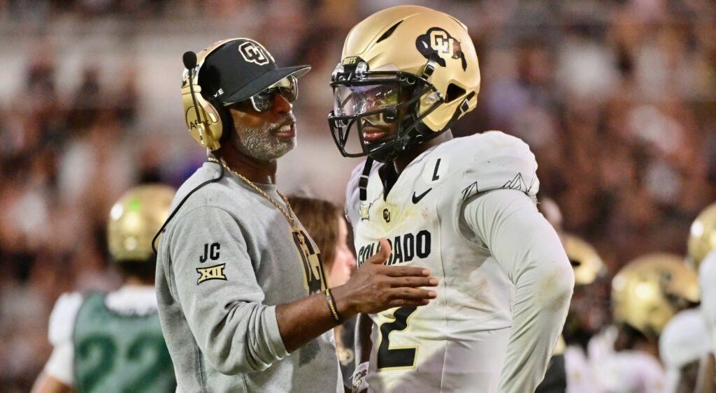 Deion Sanders and Shedeur Sanders  talking