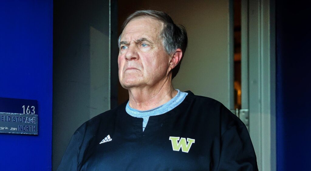 Bill Belichick looking on at Husky Stadium.