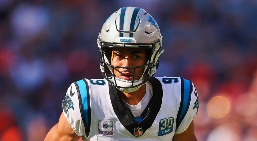 Bryce Young of Carolina Panthers looking on.