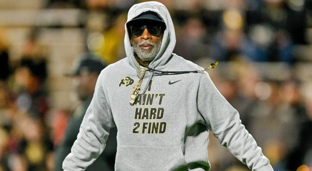 Colorado Buffaloes head coach Deion Sanders in grey hoodie