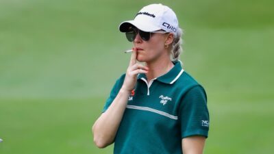 Charley Hull smoking a cigarette