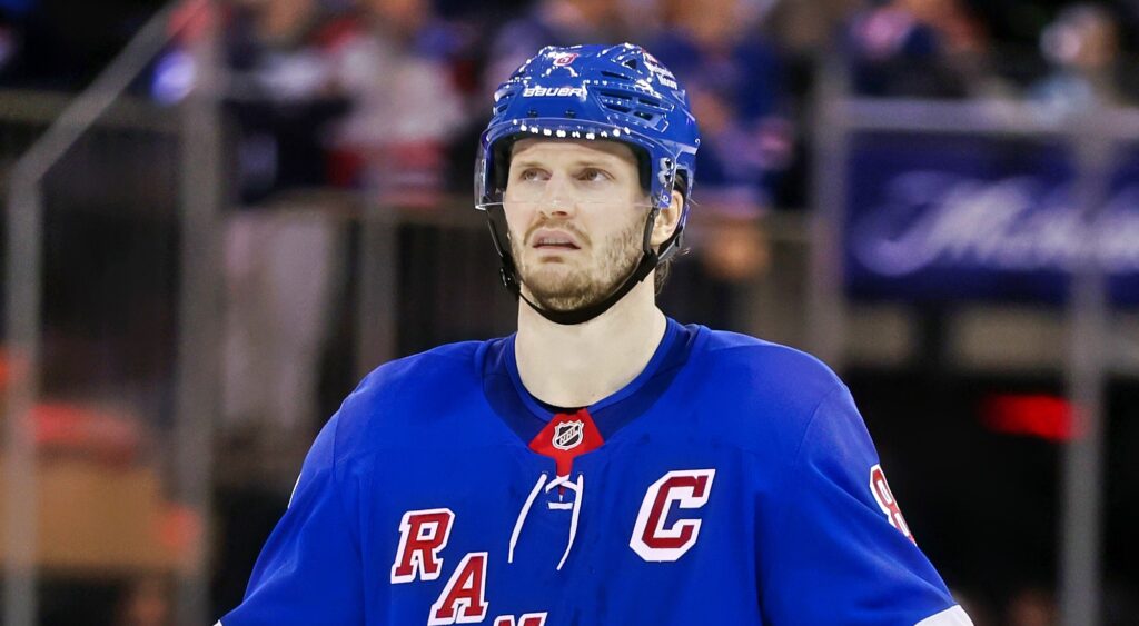 Jacob Trouba of New York Rangers looking on.