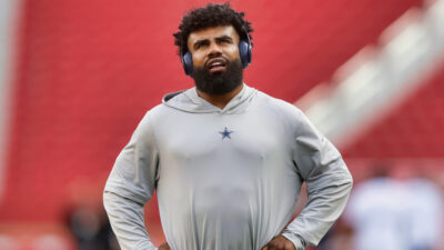 Ezekiel Elliott with his hands on his hips