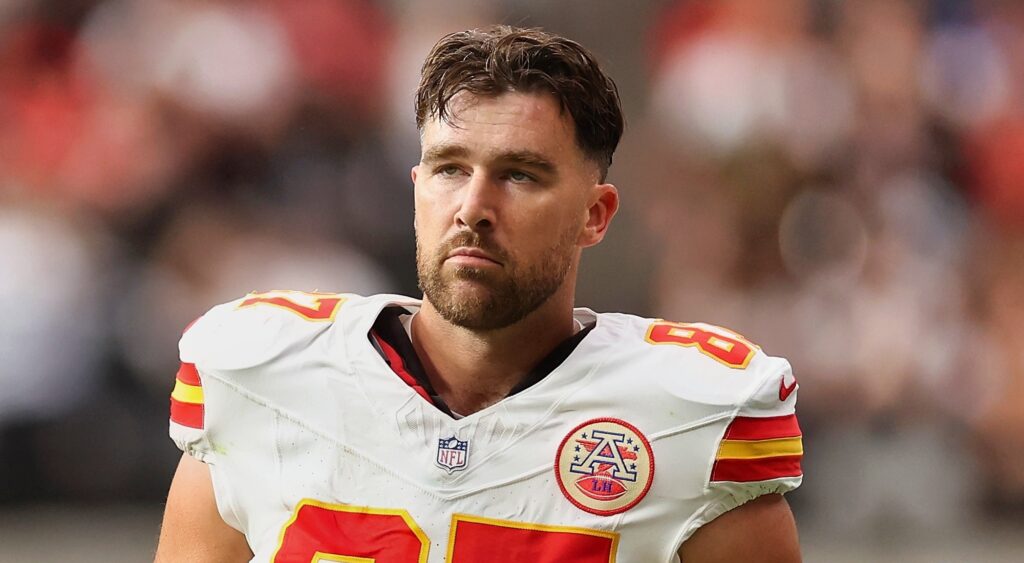 Travis Kelce of Kansas City Chiefs looking on.