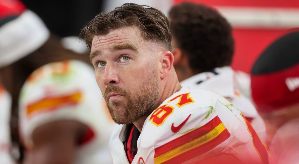 Travis Kelce sitting on bench