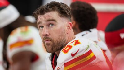 Travis Kelce sitting on bench