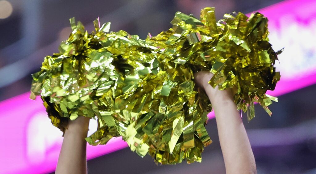 Cheerleader Pom poms being held