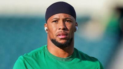 Saquon Barkley in Eagles shirt