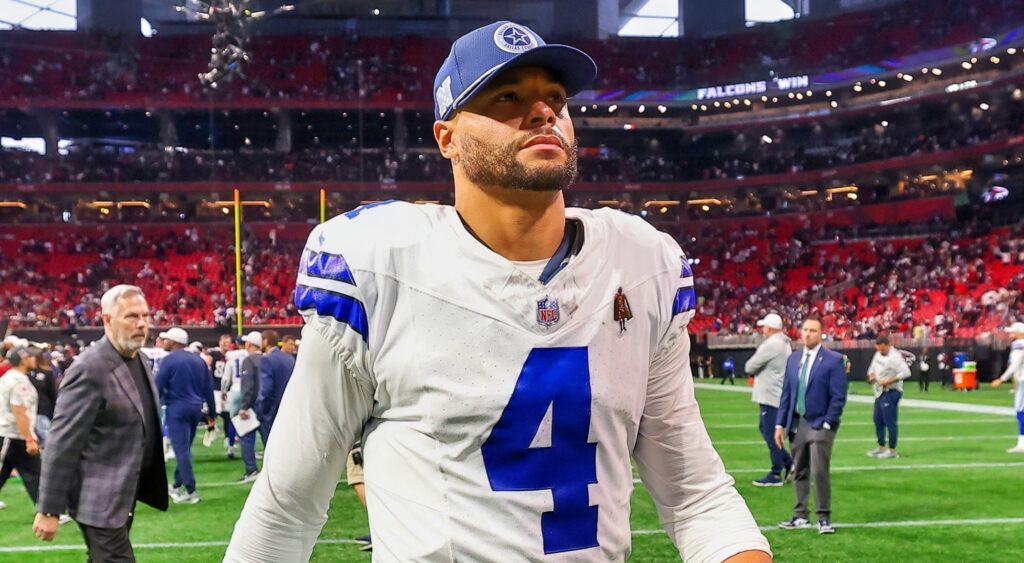 Dak Prescott of Dallas Cowboys walking off the field.