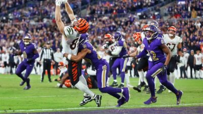 Bengals and Ravens players on field