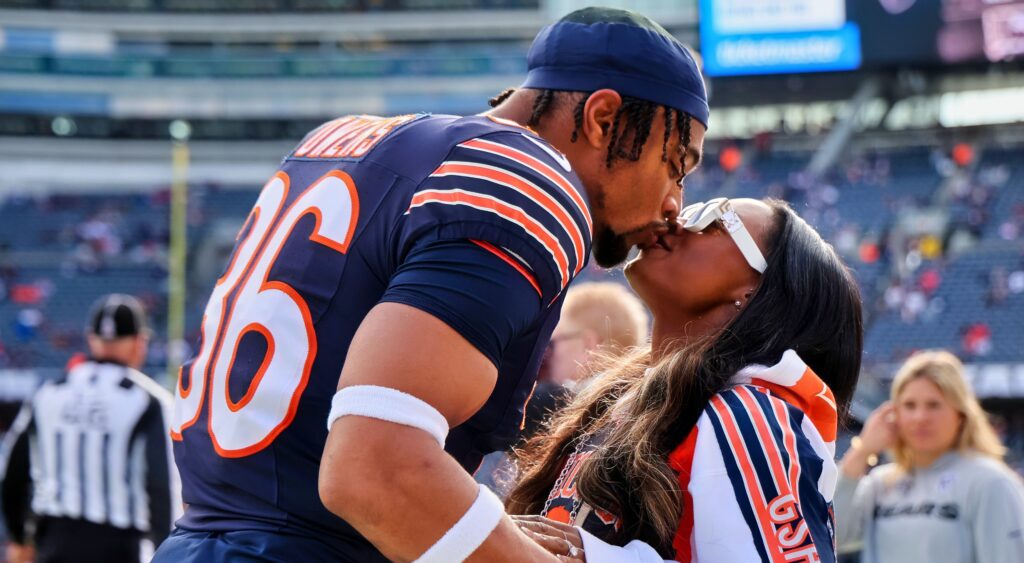 Jonathan Owens and Simone Biles kissing