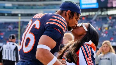 Jonathan Owens and Simone Biles kissing