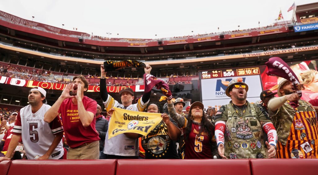 Commanders and Steelers fans cheering at the game.