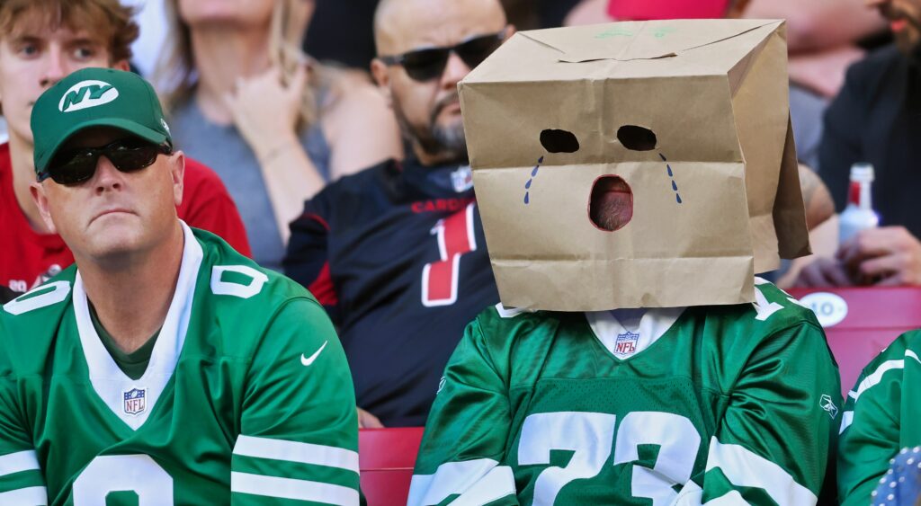 New York Jets fans with bags on thier heads