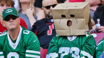 New York Jets fans with bags on thier heads