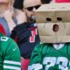 New York Jets fans with bags on thier heads