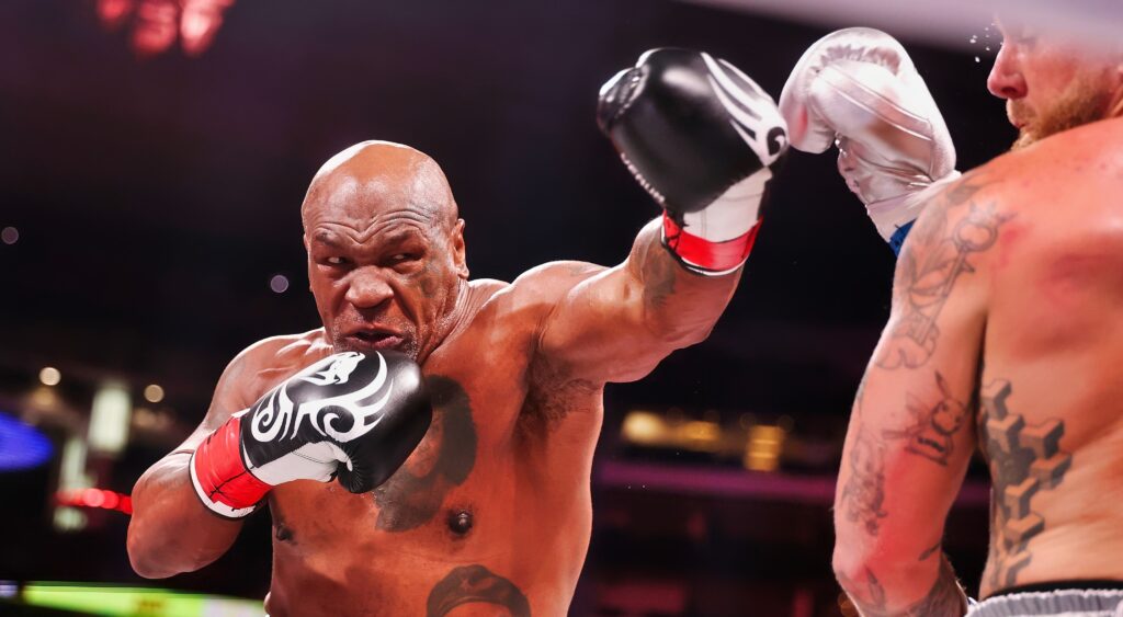 Mike Tyson fighting Jake Paul